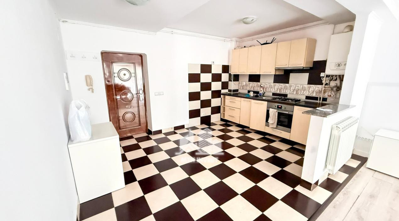 Apartament 3 camere 77,30 mp cu gradina 40 mp in Cisnadie | Renovat | Parcare 